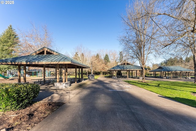 surrounding community with a yard and a gazebo