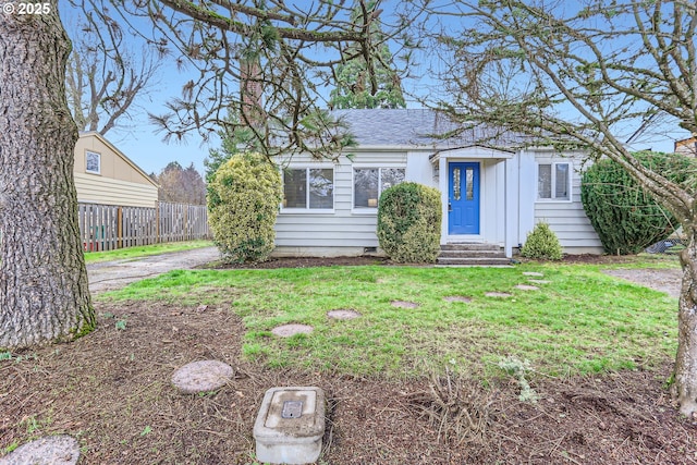 ranch-style house with a front yard