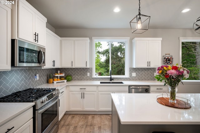 kitchen featuring a sink, light countertops, and appliances with stainless steel finishes