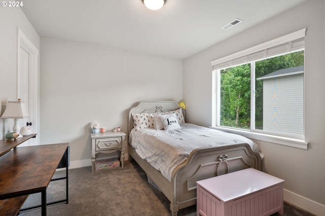 bedroom with carpet flooring, visible vents, and baseboards