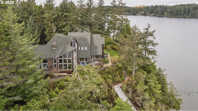 birds eye view of property featuring a water view