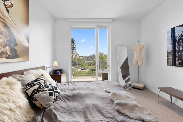 carpeted bedroom with multiple windows