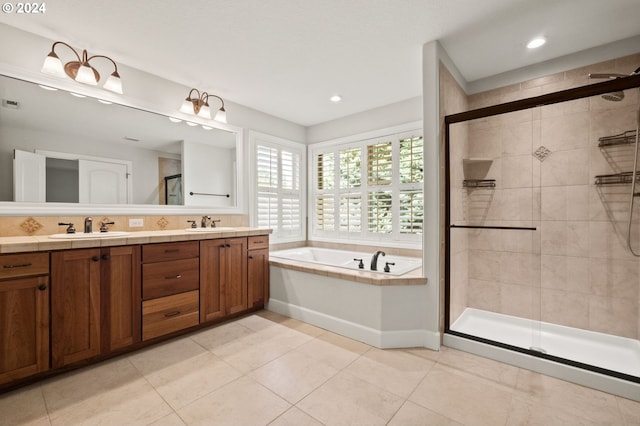 bathroom featuring vanity, separate shower and tub, and tile patterned flooring