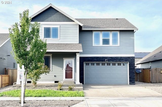 view of front of property with a garage