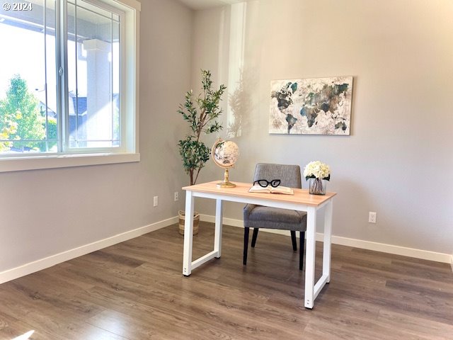 office area featuring dark wood-type flooring