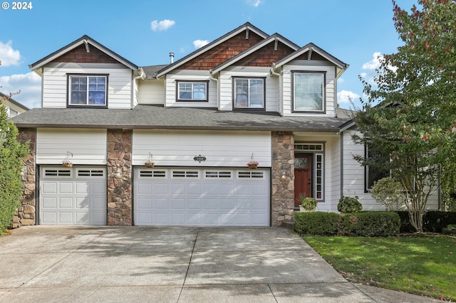 craftsman-style home featuring a garage