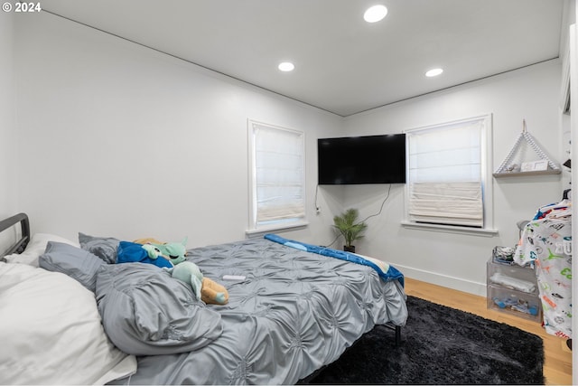 bedroom featuring hardwood / wood-style flooring