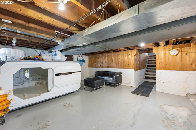 basement with wooden walls