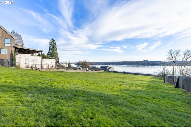 view of yard with a water view