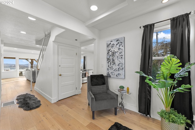 living area featuring light wood-type flooring