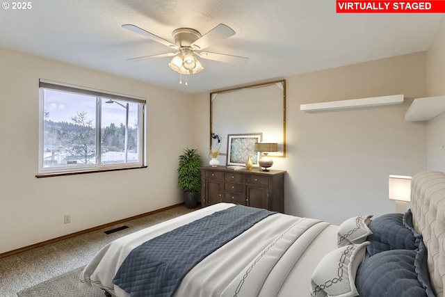 bedroom featuring ceiling fan and carpet floors