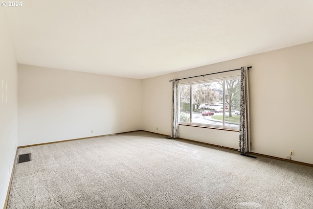 unfurnished room with carpet