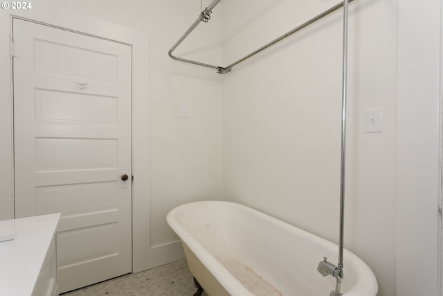 bathroom featuring a tub to relax in