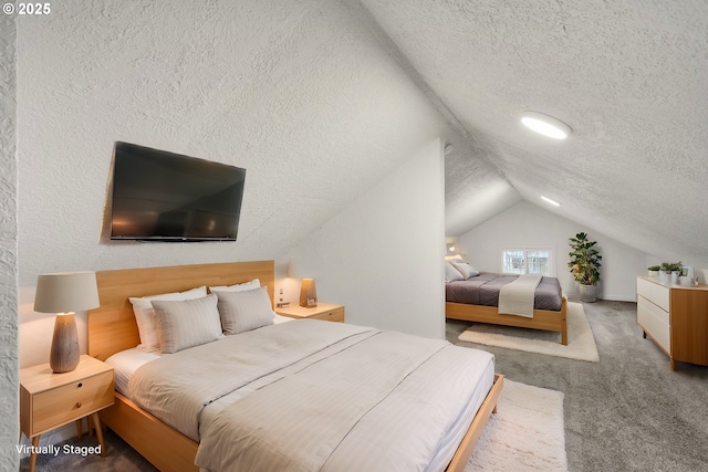 carpeted bedroom featuring a textured ceiling and vaulted ceiling