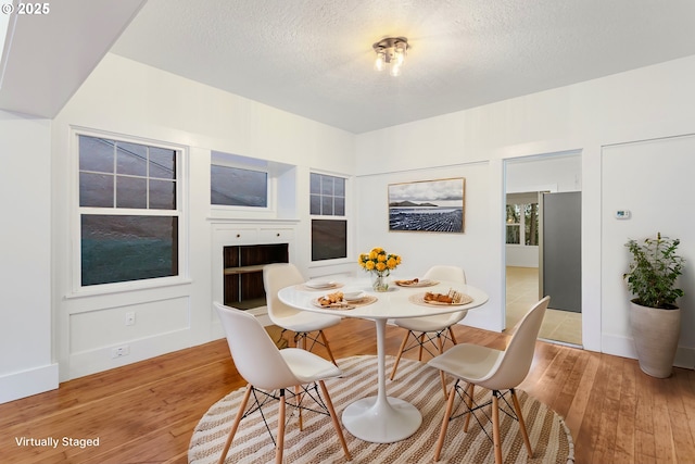 dining room featuring light hardwood / wood-style flooring