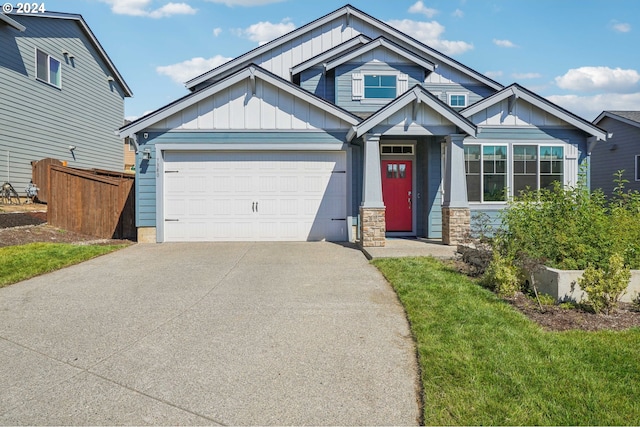 craftsman-style house with a front lawn