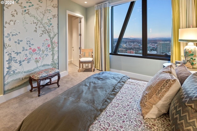 carpeted bedroom with baseboards