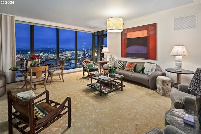 living room featuring expansive windows and visible vents