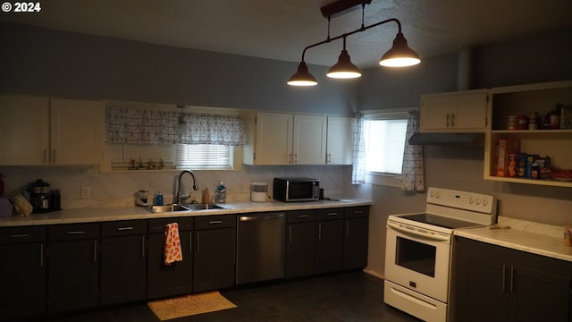 kitchen featuring pendant lighting, sink, white cabinets, white electric range oven, and stainless steel dishwasher