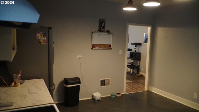 kitchen featuring stainless steel refrigerator