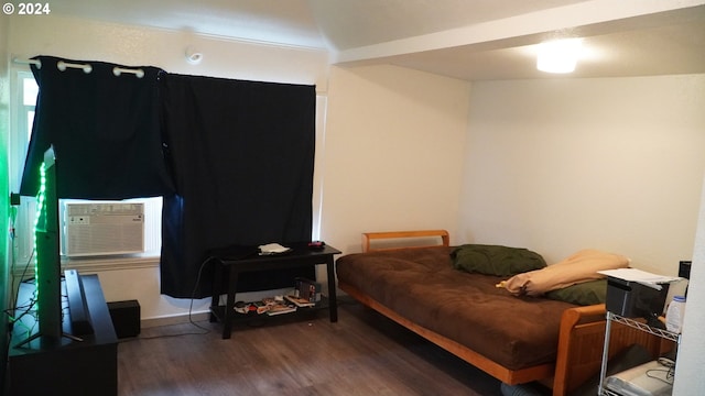 bedroom featuring dark wood-type flooring