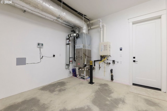 garage with heating unit and water heater