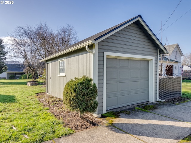 garage with a lawn