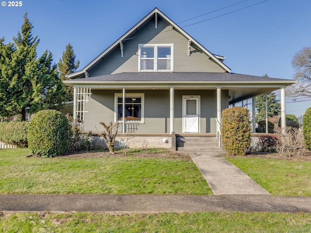 view of front of house with a front lawn and a porch