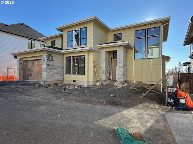 view of front facade featuring a garage