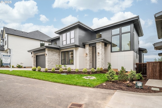 1669 NW Goodwin St, Camas, WA 98607 - view of front of home with stone siding and driveway