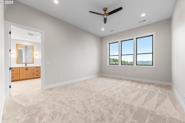 1669 NW Goodwin St, Camas, WA 98607 - empty room with ceiling fan, light colored carpet, recessed lighting, and baseboards