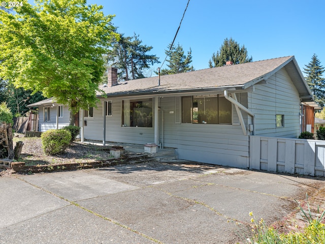 view of front of property featuring covered porch