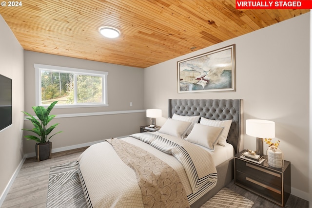 bedroom featuring wood-type flooring, vaulted ceiling, and wood ceiling