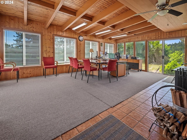 sunroom / solarium with beamed ceiling and ceiling fan