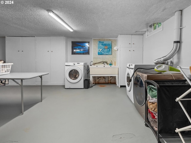 washroom with washer and dryer