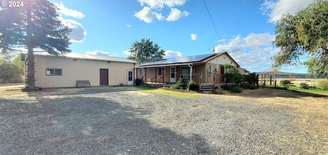 back of property with solar panels