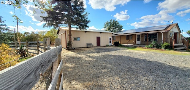 view of front of house with solar panels