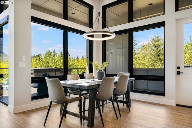 sunroom / solarium featuring a wealth of natural light