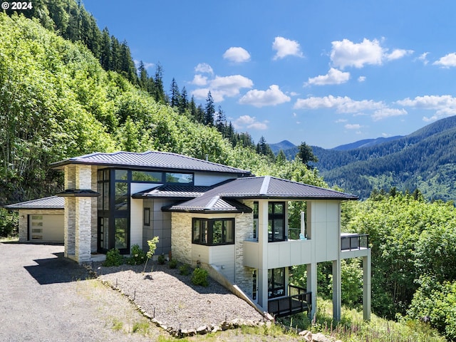 view of front of house with a mountain view