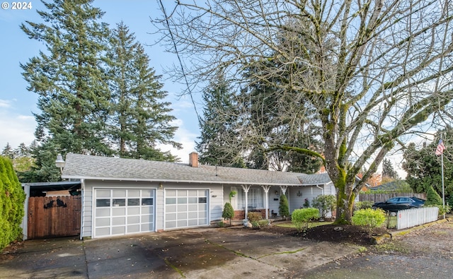 single story home featuring a garage