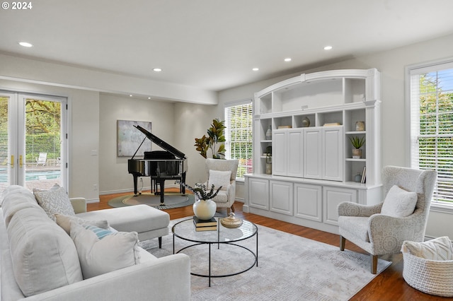 living room with light hardwood / wood-style flooring