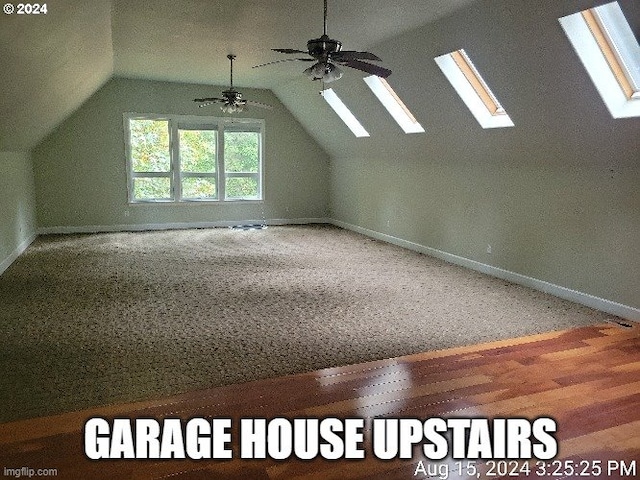 bonus room featuring vaulted ceiling, ceiling fan, and hardwood / wood-style flooring