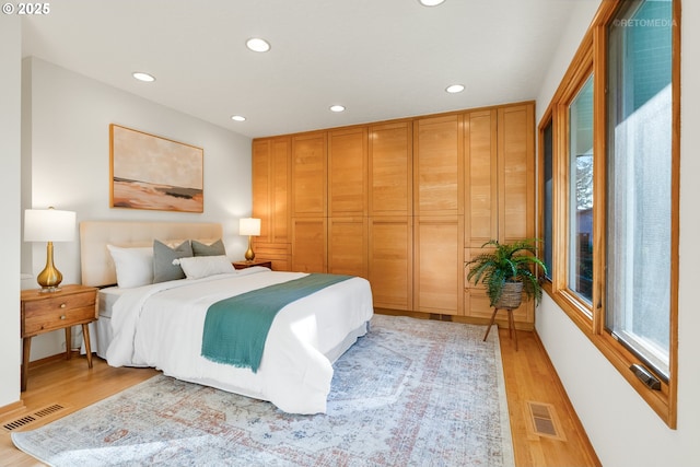 bedroom featuring light hardwood / wood-style floors