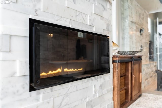 3425 NW Fairway Heights Dr, Bend, OR 97703 - detailed view of a lit fireplace
