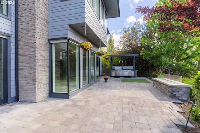3425 NW Fairway Heights Dr, Bend, OR 97703 - view of patio / terrace with exterior kitchen