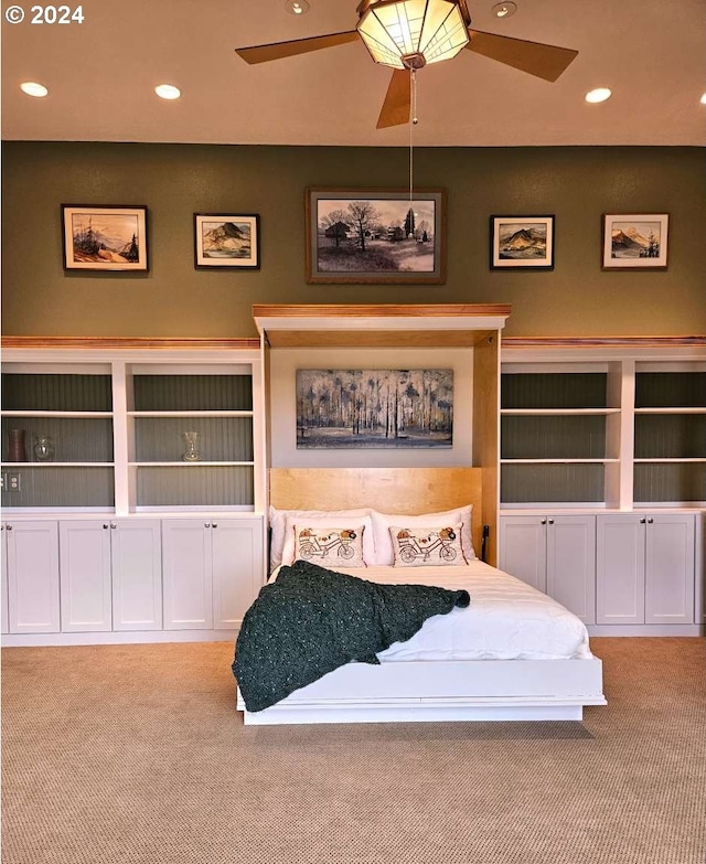 bedroom with light carpet and ceiling fan