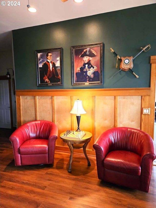 sitting room featuring hardwood / wood-style floors