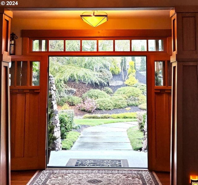 doorway with wood-type flooring