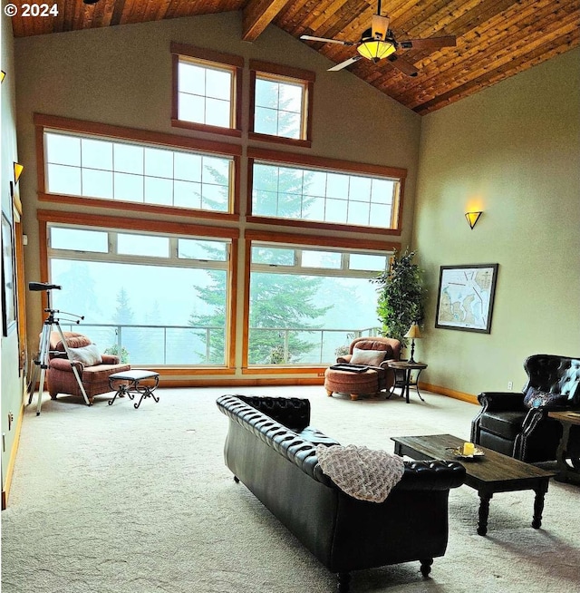 carpeted living room with wood ceiling, ceiling fan, beamed ceiling, and high vaulted ceiling