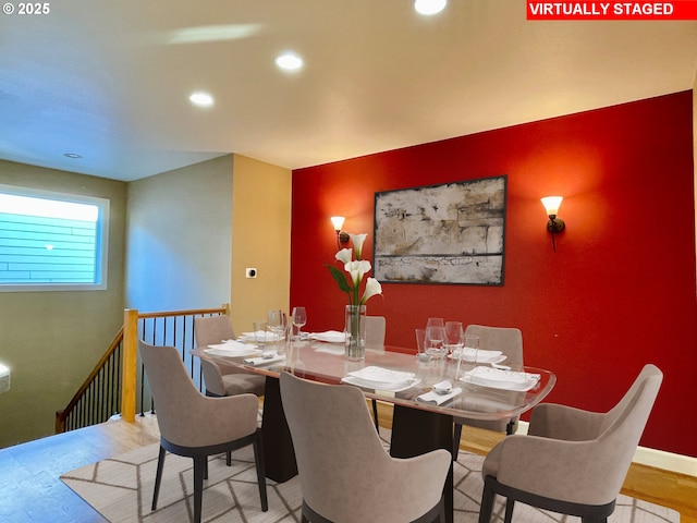 dining space featuring light hardwood / wood-style flooring